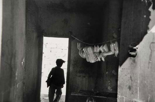 ROBERT FRANK, b. 1924: Peru, 1947 Gelatin silver print, printed 1960s. 8 ½ x 13 in. (21.6 x 33 cm). Signed, titled, and dated in ink in the margin; Lunn Archive and copyright credit stamps on the verso. Provenance: T