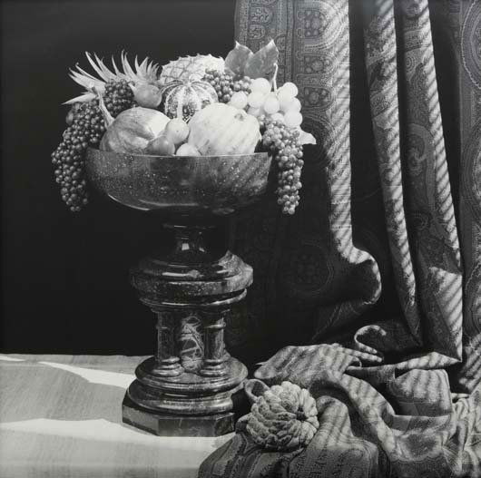 ROBERT MAPPLETHORPE, 1946-1989: Urn with Fruit, 1987 Gelatin silver print. 36 ½ x 36 ¾ in. (92.7 x 93.3 cm). Signed and dated in ink on the reverse of the flush-mount. One from an edition of 2. PROPERTY FROM THE COLLEC