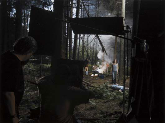 GREGORY CREWDSON: Production Still (Forest Gathering #3), 2003 Digital c-print. 14 x 18 in. (35.6 x 45.7 cm). Signed and dated lower edge. This work is from an edition of 20. Provenance: Luhring Augustine, New York
