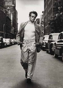 ROY SCHATT, 1919-2002: James Dean, West 68th Street, New York, 1954 Gelatin silver print, printed later. 9 ½ x 6 ¾ in. (24.1 x 17.1 cm). Signed in pencil and copyright credit stamp on the verso.
