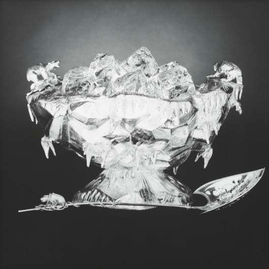 ROBERT MAPPLETHORPE, 1946-1989: Gorham 1871 Polar ice bucket and harpoon shaped spoon, 1987 Gelatin silver print. 19 ⅛ x 19 ¼ in. (48.6 x 48.9 cm). Signed, titled, dated, numbered 1/10 in ink and copyright credit repro