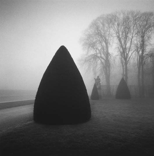 MICHAEL KENNA, b. 1953: Daybreak, Vaux Le Vicomite, France, 1996 Gelatin silver print. 7 ¾ x 7 ⅝ in. (19.7 x 19.4 cm). Signed, dated and numbered 40/45 in pencil on the mount; signed, titled, dated in pencil an