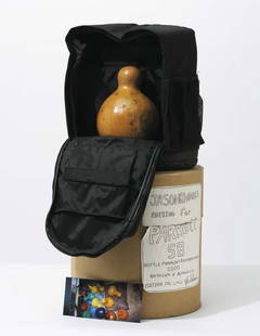 JASON RHOADES, 1965-2006: Title: JASON RHOADES, 1965-2006 Description: Bottle Pumpkin from Perfect World, 2000 Medium Dimensions Signature/Edition/Manufacture: Lacquered gourd, backpack and snapshots in cardboard container. V