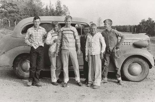 ROBERT FRANK, b. 1924: Teenagers in Tennessee - They Drive the Car, circa 1955 Gelatin silver print. 8 ½ x 12 ¾ in. (21.6 x 32.4 cm). Signed in ink in the margin; titled in ink on the verso.