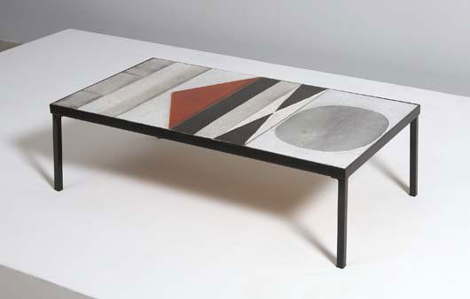ROGER CAPRON, b.1922: Coffee table, ca. 1960 Glazed ceramic tiles, painted metal. 11 £x215d; x 39 ¾ x 20 in. (29.5 x 101 x 50.8 cm). Signed in the glaze "R. CAPRON." Literature: Pierre Staudenmeyer, Roger Capro