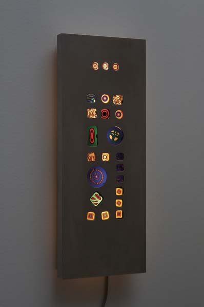 ANGELO LELLI: Murrine" wall light, ca. 1970 Stainless steel, painted metal, plastic, glass murrines. 21 x 8 £x215b; x 2 £x215c; in. (53.3 x 206 x 6 cm). Manufactured by Arredoluce, Italy, and the glass pr