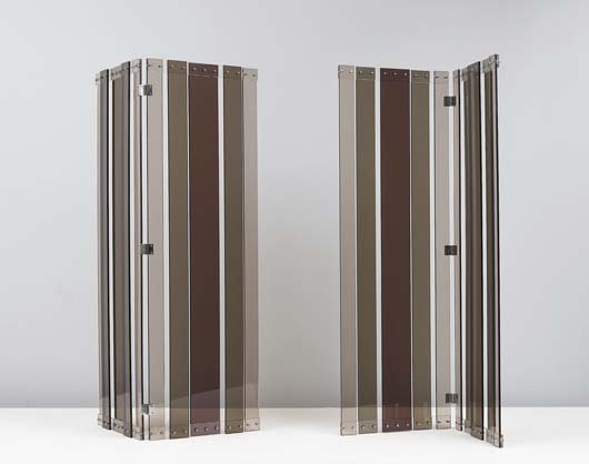 PHILIPPE JEAN: Pair of two-panel folding screens, ca. 1970 Clear and colored acrylic, chrome-plated metal (2). Each: 70 ½ in. (179.1 cm) high, 47 ½ in. (120.7 cm) wide. Literature: Anne Bony, Furniture
