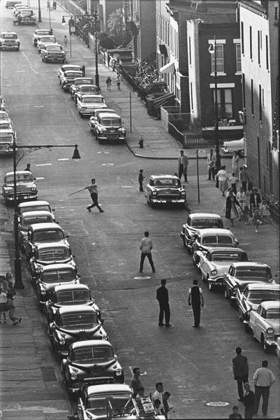 BRUCE DAVIDSON, b. 1933: Brooklyn Gang (stickball game), 1959. Gelatin silver print, printed later. 18 x 12 ⅛ in. (45.7 x 30.8 cm). Signed in pencil on the verso. PROPERTY FROM A PRIVATE EUROPEAN COLLECTION Provenance: