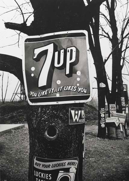 WILLIAM KLEIN, b. 1928: 7-Up, New York, 1954. Gelatin silver print, printed later. 14 ⅝ x 10 ⅜ in. (37.1 x 26.4 cm). Signed, titled, dated in pencil and credit stamp on the verso.