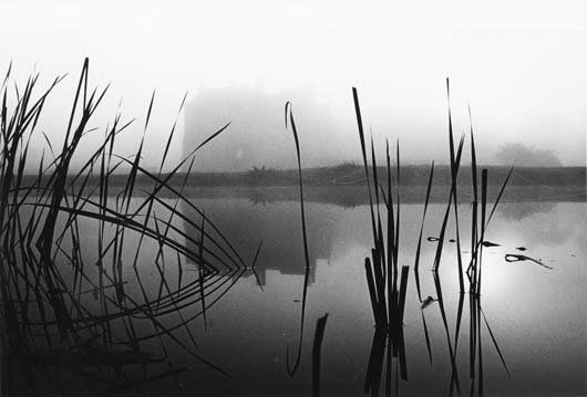 MICHAEL KENNA, b. 1953: Broughton Castle, Oxford Shire, England, 1977; Morning Cypress, Surrey, England, 1979; and Broadway Tower, Worchestershire, England, 1981. Three gelatin silver prints, printed 1980-1981. Each 6 x 9 &f