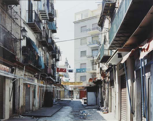 THOMAS STRUTH, b. 1954: Strasse in Palermo 1, Palermo, 1998. Color coupler print. 18 ⅛ x 22 ⅞ in. (46 x 58.1 cm). Signed in pencil, typed title, date and number 5/10 on a label affixed to the reverse of the frame