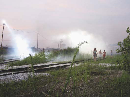 GREGORY CREWDSON, b. 1962: Production Still (Railway Children, from Beneath the Roses), 2003 Digitial c-print. 30.5 x 40.6 cm. (12 x 16 in.) Signed and dated lower edge. This work is from an edition of 20.