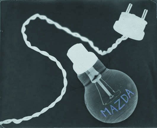 CLAUDE TOLMER, 1907-1991 Mazda light bulb, 1933 G: CLAUDE TOLMER, 1907-1991 Mazda light bulb, 1933 Gelatin silver print with gouache. 5 ¾ x 7 1/8 in. (14.6 x 18.1 cm). Signed and dated in pencil on the verso. EXHIBITED Im Rausch der Di