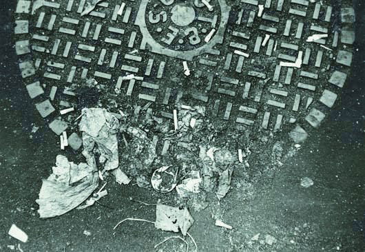 WALKER EVANS, 1903-1975 Debris on manhole cover, N: WALKER EVANS, 1903-1975 Debris on manhole cover, New York, 1968 Gelatin silver print. 9 ¼ x 13 ¼ in. (23.5 x 33.7 cm). Signed in pencil on the mount. PROVENANCE Jo Tartt, Washington DC �