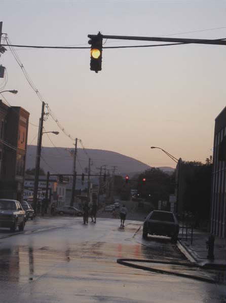 GREGORY CREWDSON, b. 1962 Production Still (Merch: GREGORY CREWDSON, b. 1962 Production Still (Merchant's Row), 2003 Digital c-print. 15 ⅞ x 11 ⅞ in. (40.3 x 30.2 cm). Signed, dated and numbered lower edge. This work is from an edition of