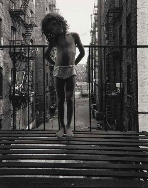 BRUCE DAVIDSON, b. 1933 Child on fire escape, 196: BRUCE DAVIDSON, b. 1933 Child on fire escape, 1966 Gelatin silver print, printed 1980s. 12 ⅜ x 9 ⅞ in. (31.4 x 25.1 cm). Signed in pencil on the verso. PROPERTY OF A PRIVATE COLLECTOR, NEW