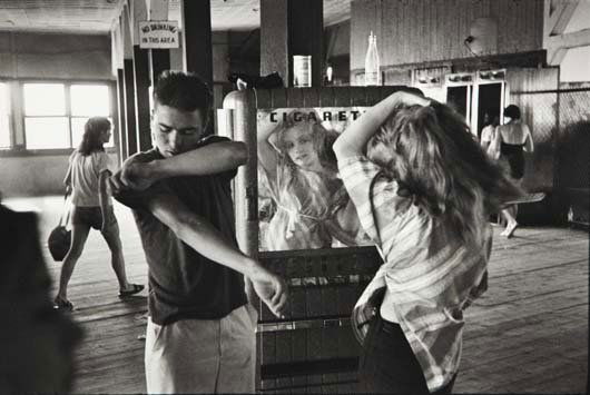 BRUCE DAVIDSON, b. 1933 Brooklyn Gang, girl combi: BRUCE DAVIDSON, b. 1933 Brooklyn Gang, girl combing hair, 1959 Gelatin silver print, printed 1980s. 8 ½ x 12 ¾ in. (21.6 x 32.4 cm). Signed in pencil on the verso. PROPERTY OF A PRIVATE