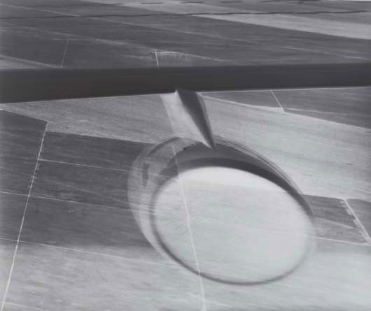 VERA LUTTER, b. 1960: Engine, Frankfurt Airport: April 19, 2001, 2001 Gelatin silver print, flush mounted on board. 23 1/2 x 28 in. (59.7 x 71.1 cm). Signed and numbered on label on reverse of the mount. This work is from