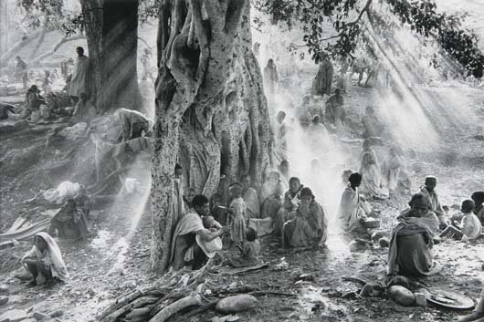 SEBASTIÄO SALGADO, b. 1944: Tigray, Ethiopia, 1985 Gelatin silver print. 11 1/2 x 17 1/4 in. (29.2 x 43.8 cm). Blindstamp credit in the margin; signed, titled and dated in pencil on the verso.