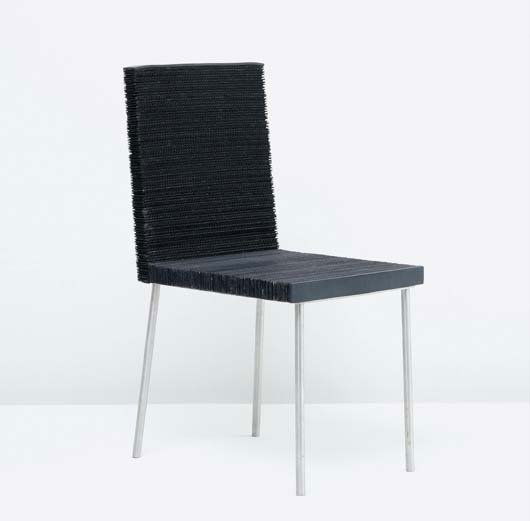 FERNANDO AND HUMBERTO CAMPANA, b. 1961, b. 1953: "Papel" chair, ca. 1995 Painted corrugated cardboard, stainless steel, painted MDF. 34 3/8 in. (87.3 cm) high. Produced by Estudio Campana, Brazil. From the edition of five. LITERATURE Antibodies –