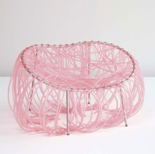 FERNANDO AND HUMBERTO CAMPANA, b. 1961, b. 1953: "Anenome" chair, ca. 2000 PVC tubing, painted tubular metal, chrome-plated metal. 24 1/2 in. (62.2 cm) high. Manufactured by Edra, Italy. LITERATURE Antibodies – Fernando & Humberto Campana 1989-200