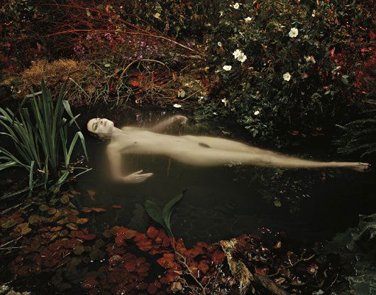 NADAV KANDER, Erin O'Connor (After Millais) , 2004: Colour coupler print, printed 2009. 102 x 127 cm. (40 1/8 x 50 in). Signed in ink on the reverse of the flush-mount; signed, titled, dated and numbered 2/5 in ink on a label affixed to the reverse of