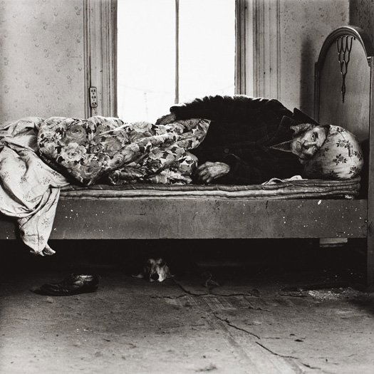 BRUCE DAVIDSON, East 100th Street, New York City,: East 100th Street, New York City, 1966-1968 Gelatin silver print, printed later. 18 5/8 x 18 5/8 in. (47.3 x 47.3 cm). Signed in pencil on the verso. LITERATURE Thames & Hudson, Bruce Davidson, pl. 51