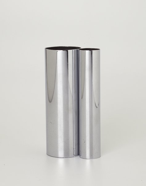RUSSEL WRIGHT, Rare double tube vase, ca. 1930: Rare double tube vase, ca. 1930 Chrome-plated steel. 8 3/4 in. (22.2 cm) high. Produced by Russel Wright Inc., USA. Underside impressed twice with "RUSSEL WRIGHT."