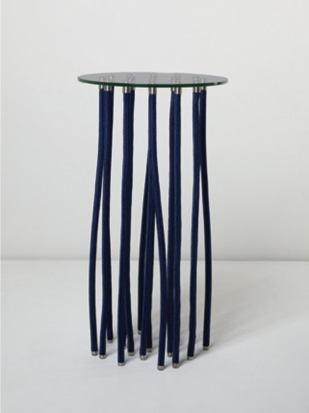 FABIO NOVEMBRE, Tall "Org" table, 2006: Tall "Org" table, 2006 Polypropylene rope-covered steel, glass, stainless steel. 43 1/2 in. (110.5 cm) high, 23 5/8 in. (60 cm) diameter. Manufactured by Cappellini, Italy. One leg signed in pen with