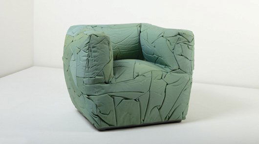 PETER TRAAG, "Sponge" chair, 2004: Sponge" chair, 2004 Polyurethane, Tevira upholstery. 29 in. (73.7 cm) high. Manufactured by Edra, Italy. Underside molded with "edra/SPONGE/design: Peter Traag." LITERATURE Tom Dixon, et al., eds., &F