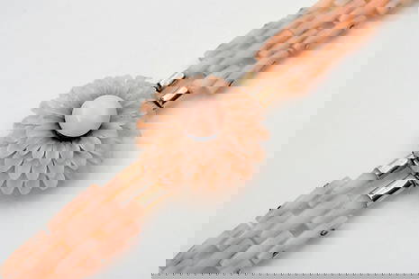 A MID VICTORIAN 'ANGEL SKIN' CORAL BRACELET, CIRCA: A MID VICTORIAN 'ANGEL SKIN' CORAL BRACELET, CIRCA 1870, THE CENTRAL DOMED CHRYSANTHEMUM TO A THREE ROW BRICK LINK BRACELET, WITH GOLD TERMINALS AND CLASP