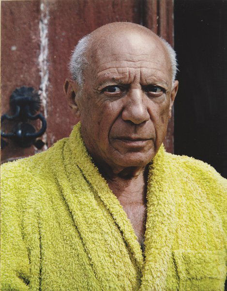 DAVID DOUGLAS DUNCAN, Picasso, clad in a bright gr: THIS LOT IS SOLD WITH NO RESERVE Picasso, clad in a bright green terry-cloth robe, confronts the camera on front steps of Chateau de Vauvenargues, 1950 Color coupler print. 19 1/2 x 15 1/8 in. (49.5 x