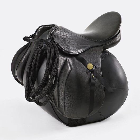 IKA KUENZEL, Caution! This is Rodeo' chair, 2006: Caution! This is Rodeo' chair, 2006 Original leather stock saddle, synthetic rope, painted metal, ribbon, plastic, brass. 24 1/2 x 24 7/8 x 23 5/8 in. (62.2 x 63.2 x 60 cm.). From the edition of 20. U