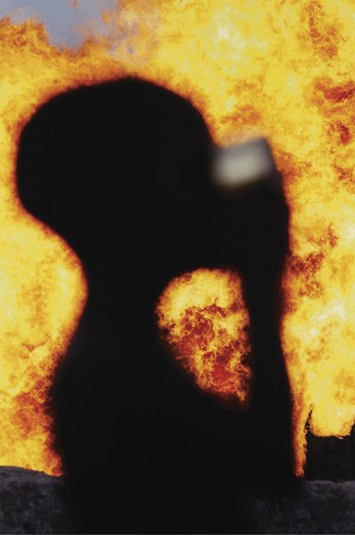 GEORGE OSODI, Niger Boy from Oil Rich Niger Delta,: Niger Boy from Oil Rich Niger Delta, 2006 Fujicolor Crystal Archive print. 47 1/4 x 31 1/2 in. (120 x 80 cm). Signed, titled, dated and numbered 3/5 in ink on a label affixed to the reverse of the mou