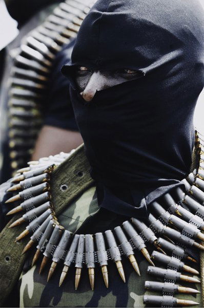 GEORGE OSODI, Delta Rebel from Oil Rich Niger Delt: Delta Rebel from Oil Rich Niger Delta, 2006 Fujicolor Crystal Archive print. 47 1/4 x 31 1/2 in. (120 x 80 cm). Signed, titled, dated and numbered 4/5 in ink on a label affixed to the reverse of the m