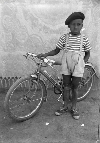 SEYDOU KEÏTA, Untitled, circa 1949: Untitled, circa 1949 Gelatin silver print. 23 1/2 x 19 1/2 in. (59.7 x 49.5 cm). Signed and dated in ink in the margin. PROPERTY FROM THE JEAN PIGOZZI COLLECTION MALI/FRANCE PROVENANCE Acquired direct