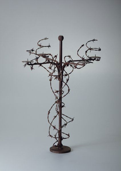 FERNANDO AND HUMBERTO CAMPANA, Rare "Via Crucis" c: Rare "Via Crucis" candelabra, 1989 Iron, barbed wire. 24 in. (61 cm.) high. Produced by Estudio Campana, Brazil. One from the edition of two. Together with a certificate of authenticity from Estud