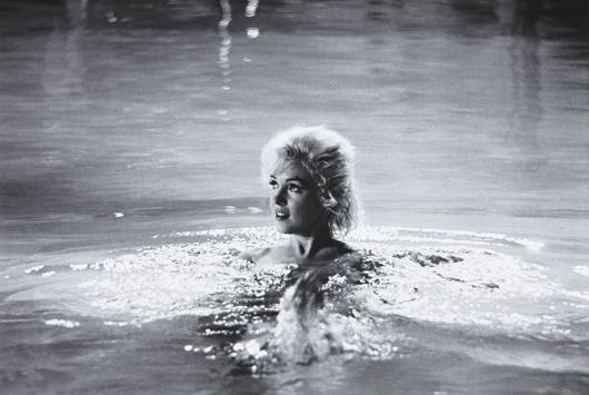 LAWRENCE SCHILLER, Marilyn Monroe, 1962: Marilyn Monroe, 1962 Gelatin silver print, printed later. 26 1/8 x 38 in. (66.4 x 96.5 cm). Signed and numbered 41/75 in ink in the margin. In May 1962, Lawrence Schiller photographed Marilyn Monroe f