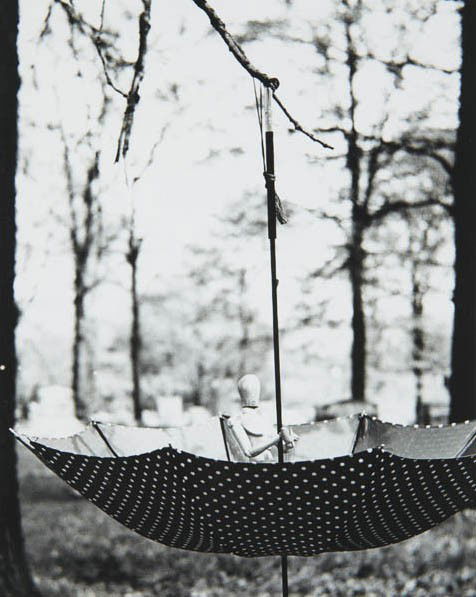 RALPH EUGENE MEATYARD, Untilted (doll and umbrella): Untilted (doll and umbrella), 1960 Gelatin silver print. 7 1/4 x 5 3/4 in. (18.4 x 14.6 cm). Signed by Madelyn O. Meatyard in ink on the verso. PROVENANCE From the Estate of the Artist