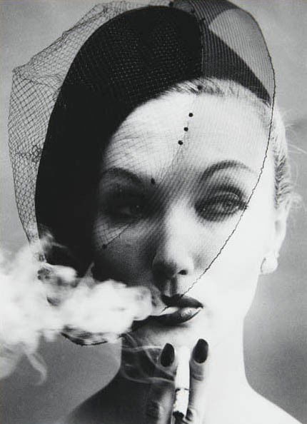 WILLIAM KLEIN, Smoke + Veil, Paris (Vogue), 1958: Smoke + Veil, Paris (Vogue), 1958 Gelatin silver print, printed later. 17 3/4 x 12 7/8 in. (45.1 x 32.7 cm). Signed, titled and dated in pencil on the verso. PROPERTY FROM THE PAUL TOMLINSON COLLECTIO