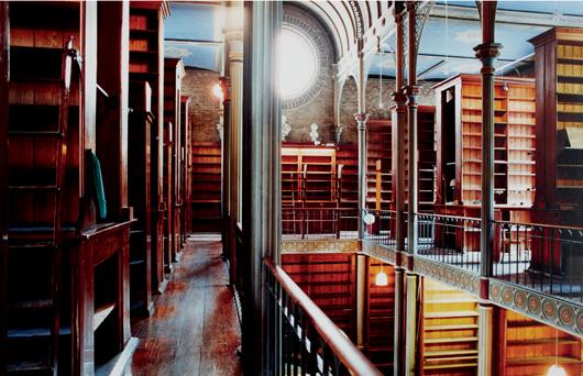 CANDIDA HÖFER, Universitätsbibliothek Kopenhagen I: Universitätsbibliothek Kopenhagen II, 1995 C-print. 15 x 22 3/8 in. (38.1 x 56.8 cm). Signed "Candida Höfer" on a label adhered to the reverse. This work is from an edition of six. PROVENANCE Karyn