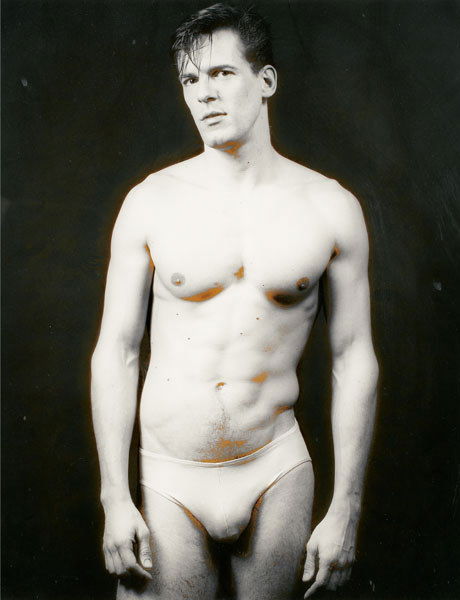ROBERT MAPPLETHORPE (1946-1989) MAN IN BATHING: ROBERTMAPPLETHORPE(1946-1989)MAN IN BATHING SUITsigned and dated "Robert Mapplethorpe '83" lower right; stamped on the rever