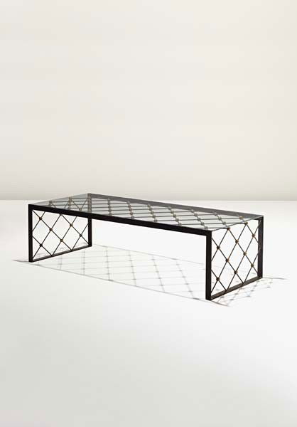 JEAN ROYÈRE, "Tour Eiffel" low table, ca. 1947: Tour Eiffel" low table, ca. 1947 Painted iron, painted metal, glass. 13 3/4 x 51 x 21 1/4 in. (34.9 x 129.5 x 54 cm) LITERATURE Jean Royère, exh. cat., Galerie Jacques Lacoste, Paris, 1999, pp. 97–
