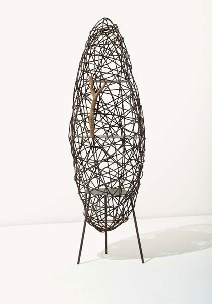 FERNANDO and HUMBERTO CAMPANA, Unique and important: Unique and important "Casulo" cabinet, 1989 Iron, aluminum, jabuticabeira branch. 70 in. (177.8 cm.) high, 24 in. (61 cm.) diameter Produced by Estudio Campana, Brazil. From the Orgânicos series. Tog