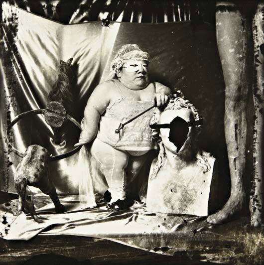 JOEL-PETER WITKIN Portrait of a Dwarf, Los Angeles,: Portrait of a Dwarf, Los Angeles, 1987 Gelatin silver print. 14 3/4 x 15 in. (37.5 x 38.1 cm). Signed, titled, dated, numbered 5/15 and copyright in pencil on the verso. LITERATURE Celant, Joel-Peter 