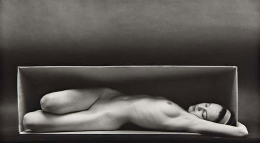 RUTH BERNHARD In the Box (Horizontal), 1962: In the Box (Horizontal), 1962 Gelatin silver print, printed later. 11 1/2 x 20 1/4 in. (29.2 x 51.4 cm). Signed in pencil in the margin; signed, titled and dated in pencil on the verso. LITERATURE Chr