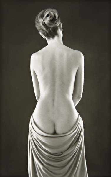 RUTH BERNHARD Draped Torso, 1962: Draped Torso, 1962 Gelatin silver print, printed later. 13 1/2 x 8 1/2 in. (34.3 x 21.6 cm). Signed in pencil on the mount; signed, titled, dated in pencil and copyright credit stamp on the reverse