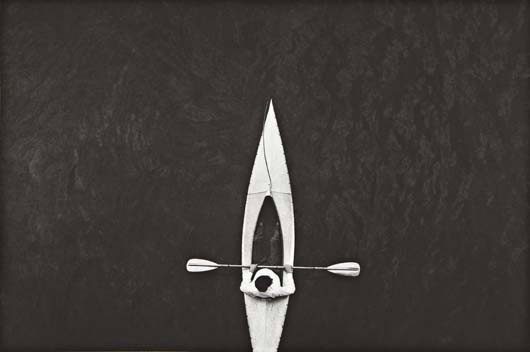 RAY K. METZKER Kayak, Frankfurt, 1961: Kayak, Frankfurt, 1961 Photogravure, printed 1995. 12 3/4 x 19 1/4 in. (32.4 x 48.9 cm). Signed, dated '1995' and numbered 17/40 in pencil in the margin. PROVENANCE Peter Fetterman Gallery, Santa Mon