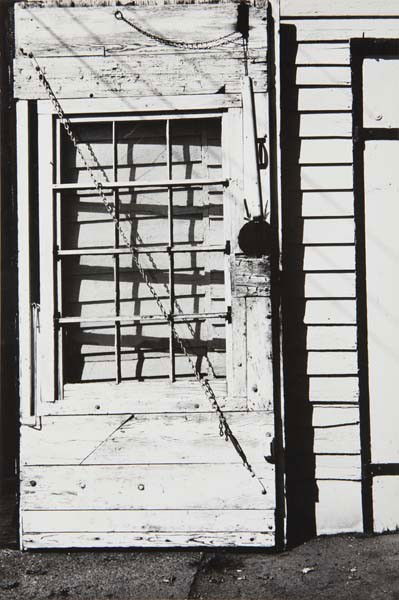 WALKER EVANS Hightstown, N.J., 1963: Hightstown, N.J., 1963 Gelatin silver print. 8 1/8 x 5 1/2 in. (20.6 x 13.9 cm). Titled, dated in an unidentified hand in pencil, credit and Lunn Archive stamps on the reverse of the mount. PROVENANC