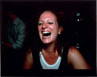 Nan Goldin: Self-Portrait Laughing, Paris 1999 Cibachrome print, on photo paper, the full sheet. S. 16 x 20 in. (40.6 x 50.8 cm) Signed and numbered 41/200 in blue ink on the reverse, published by Matthew Marks G